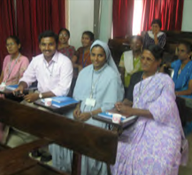 Group of adult students sitting at desks