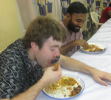 Richard's grandson, Jim, enjoying a local Indian dish