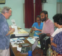 Photo of Richard Groves, Dr. Reena George, and Mr. Hamilton I