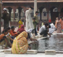 Locals washing in pool in India