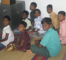 Group of boys sitting in a classroom in India