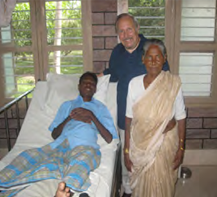 Richard with patient and family member